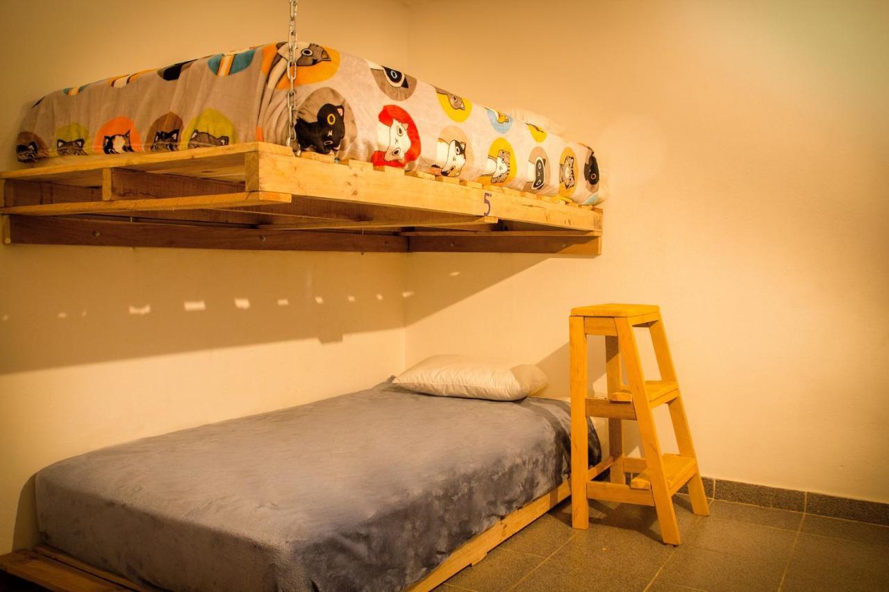 Cama en habitación compartida de 6 camas